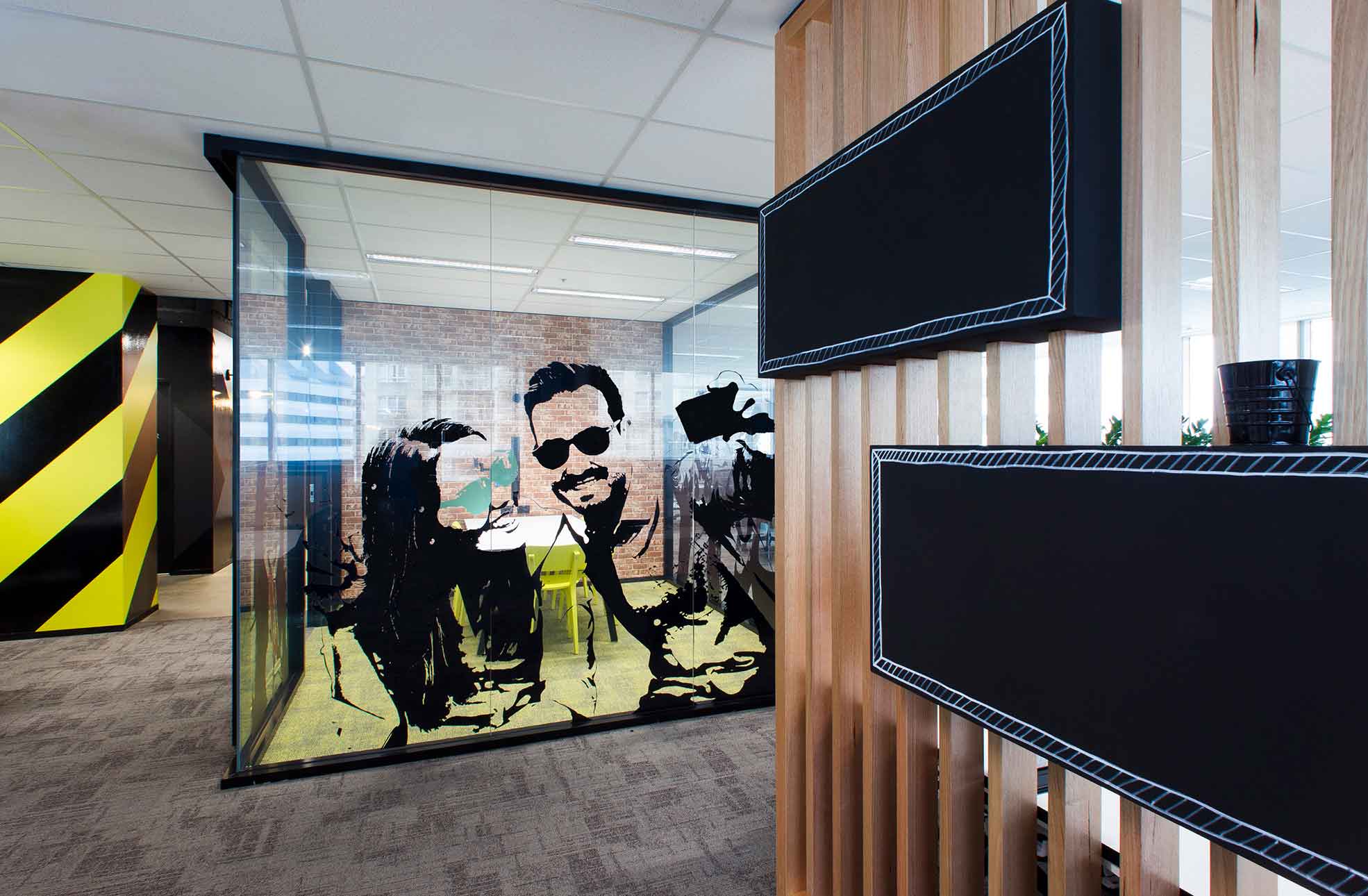 Modern Office fitout with walls & glassed offices decorated with fun & interesting murals