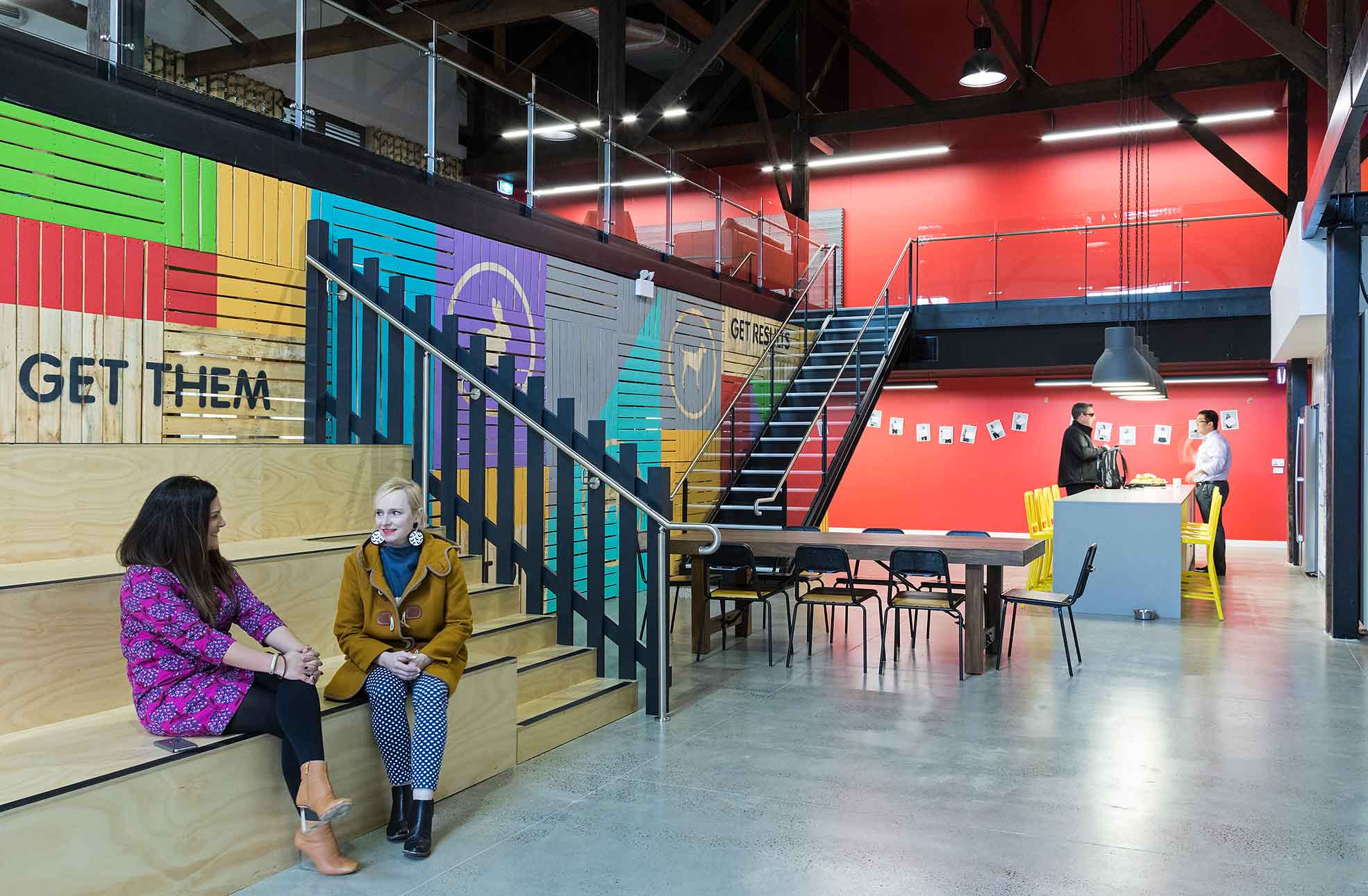 Modern warehouse fitout with 2 women sitting chatting